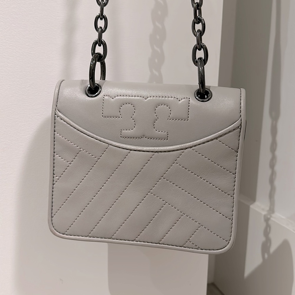 Quilted Tory Burch small grey crossbody purse